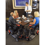 Golden BuzzAround EX Extreme 4-Wheel Heavy Duty Long Range Travel Scooter being used indoors
