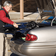 Standard Transport Chair being stored in a car trunk