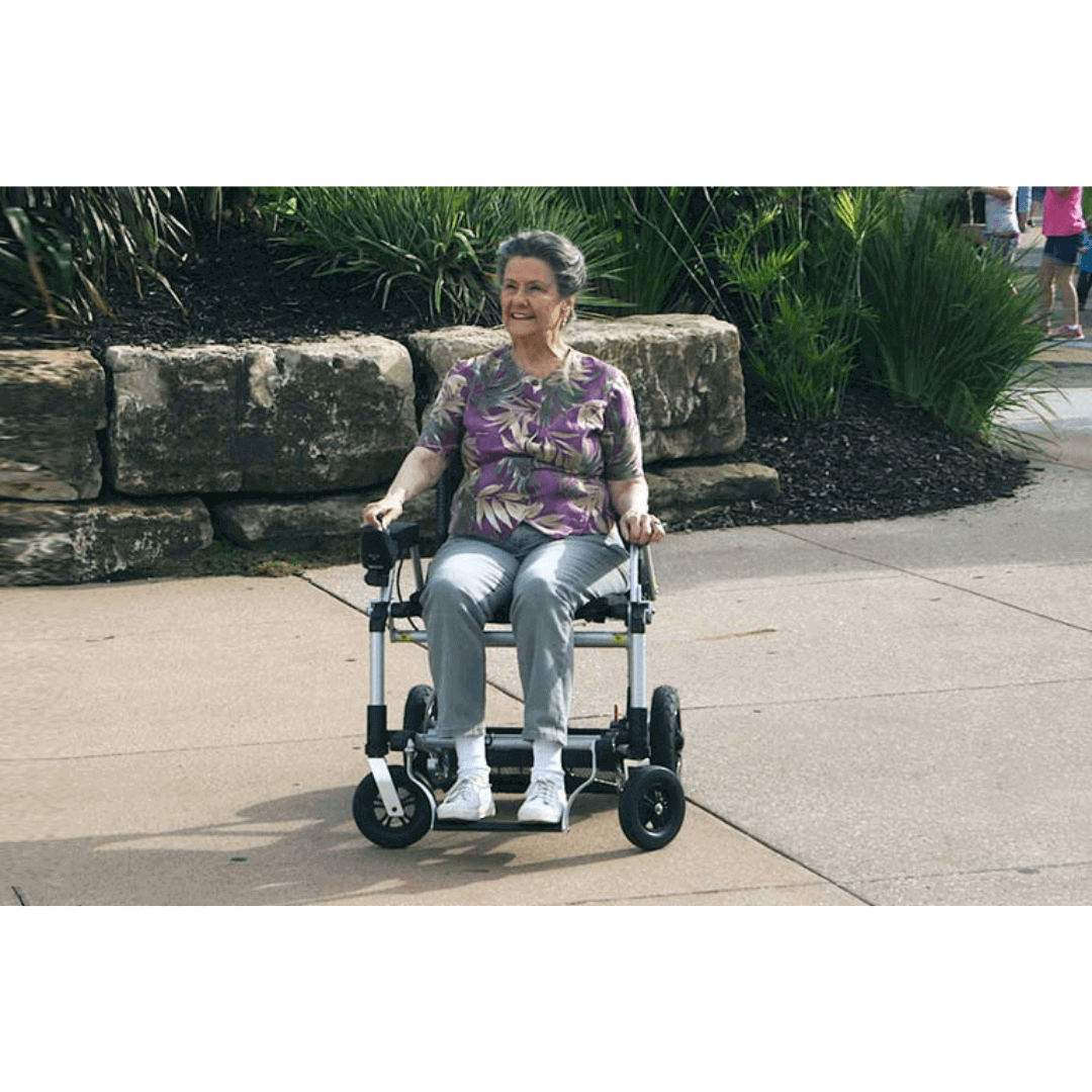 Journey Zoomer Chair Portable Lightweight Power Wheelchair with patient 2