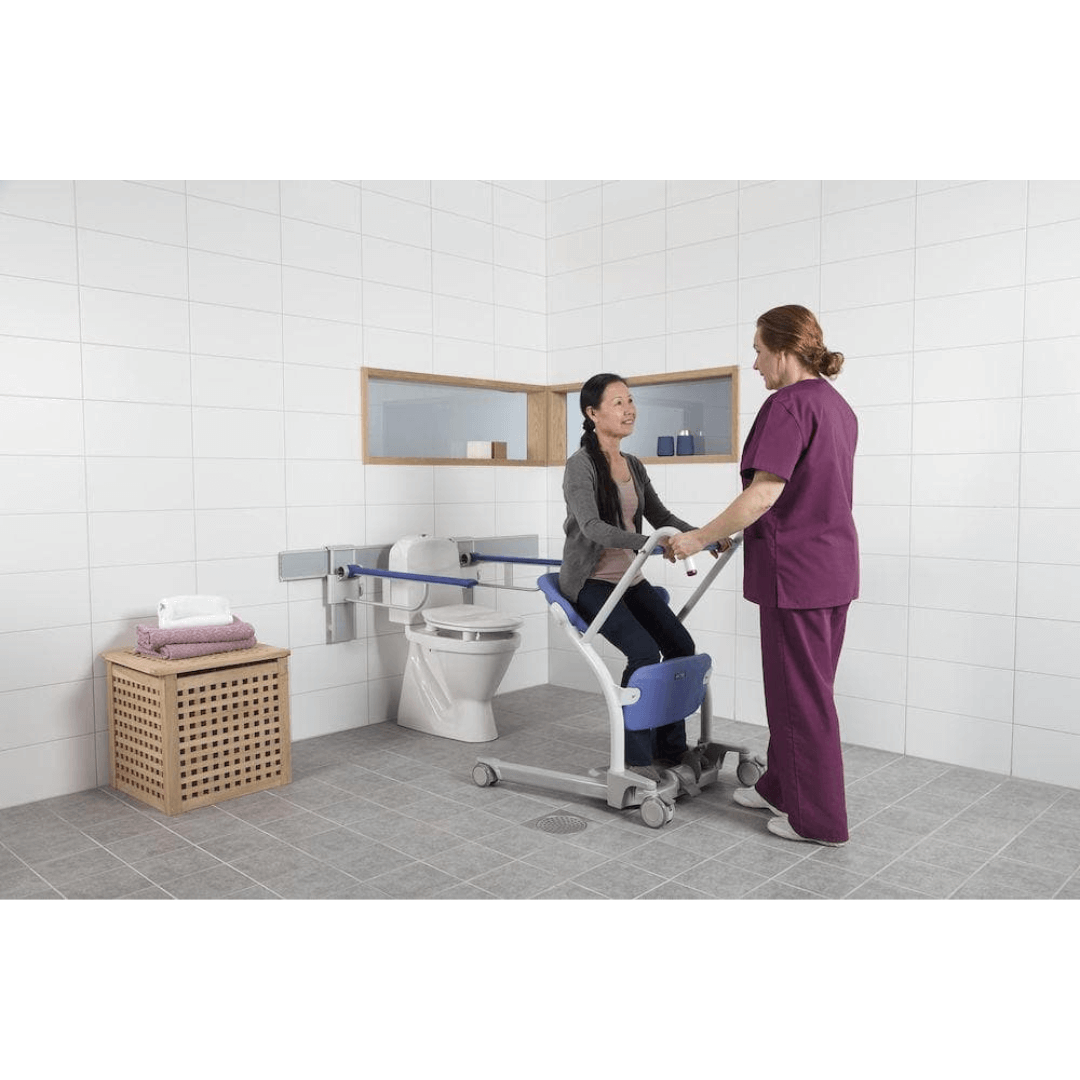 Sara Stedy Stand-Assist Manual Patient Standing Aid with patient and caregiver 4